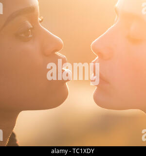 Young women pout lips for kiss, makeup Stock Photo