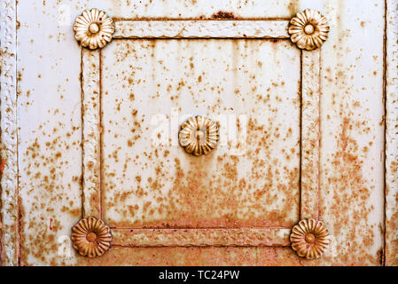 square metal frame with a pattern on a rusty wall. fence. background. texture Stock Photo