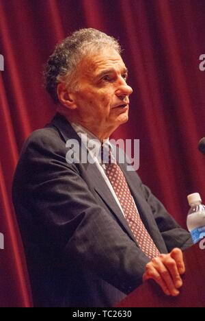 Angled close-up shot, in profile, of activist and attorney Ralph Nader speaking from a podium during a Milton S Eisenhower Symposium, Homewood Campus of Johns Hopkins University, Baltimore, Maryland, September 28, 2006. From the Homewood Photography Collection. () Stock Photo