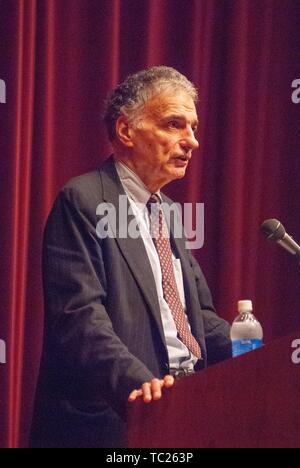 Low angle profile shot of activist and attorney Ralph Nader speaking from a podium during a Milton S Eisenhower Symposium, Homewood Campus of Johns Hopkins University, Baltimore, Maryland, September 28, 2006. From the Homewood Photography Collection. () Stock Photo