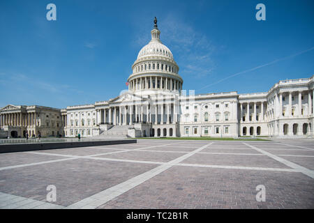 Capitol building wide angle view with American flag at half-mast Stock Photo