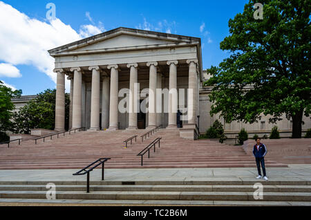 The National gallery of Art building with steps leading up the entrance viewed from Madison Drive, Washington DC, USA on 14 May 2019 Stock Photo