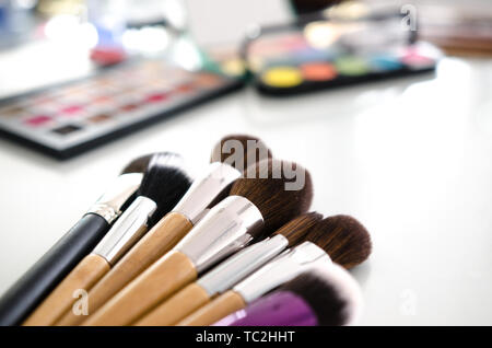 Beauty tools palettes collection. Brush on white table Stock Photo