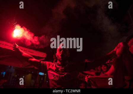 Granada, Spain. 04th June, 2019. Granada CF fan is seen celebrating with a flare the promotion of his team. Supporters of the Granada Football Team celebrate the promotion to the Santander League (Spanish First Football League) of their team after get the second place in the Spanish Second League Credit: SOPA Images Limited/Alamy Live News Stock Photo