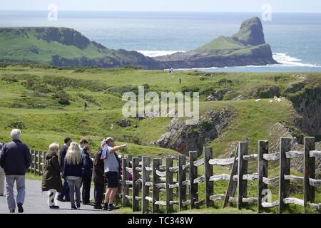 Gower, Swansea, Wales, UK. 5th June 2019. Weather: A lovely sunny day with a blustery wind met visitors at National Trust Rhosili (correct,1's') on the Gower peninsula, south Wales. The headland reserve area affords spectacular views of Rhossili (correct, 2's') Bay and the iconic promontory of Worms Head. More showery conditions are forecasting.  Credit: Gareth Llewelyn/Alamy Live News Stock Photo