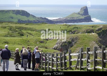 Gower, Swansea, Wales, UK. 5th June 2019. Weather: A lovely sunny day with a blustery wind met visitors at National Trust Rhosili (correct,1's') on the Gower peninsula, south Wales. The headland reserve area affords spectacular views of Rhossili (correct, 2's') Bay and the iconic promontory of Worms Head. More showery conditions are forecasting.  Credit: Gareth Llewelyn/Alamy Live News Stock Photo