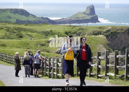 Gower, Swansea, Wales, UK. 5th June 2019. Weather: A lovely sunny day with a blustery wind met visitors at National Trust Rhosili (correct,1's') on the Gower peninsula, south Wales. The headland reserve area affords spectacular views of Rhossili (correct, 2's') Bay and the iconic promontory of Worms Head. More showery conditions are forecasting.  Credit: Gareth Llewelyn/Alamy Live News Stock Photo