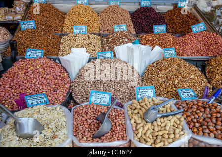 April 28, 2019. Athens, Greece. Nuts variety at street market stall. Proper healthy seeds background for vegan and vegetarian. Stock Photo