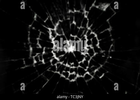 Blurred background in black with a texture of broken glass Stock Photo