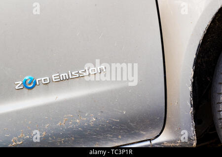 Zero Emission logo sign on electric car Stock Photo