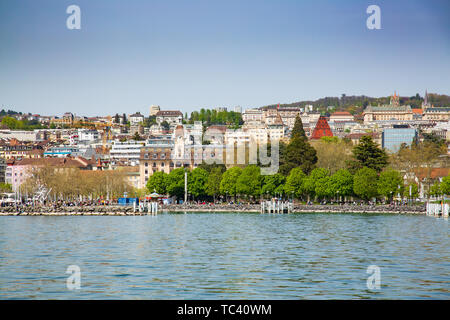 View of Lausanne city taken from ferry boat on Lake Geneva in Switzerland  Stock Photo