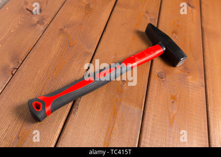 hammer on wooden background. Top view Stock Photo