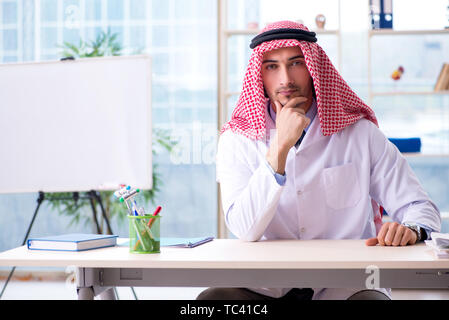 Arab doctor working in the clinic Stock Photo