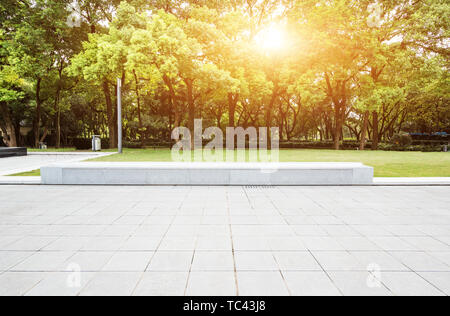 Empty marble floor near green forest Stock Photo