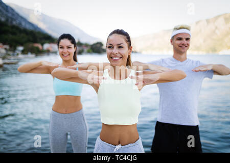 Group Smiling Fit Happy People Doing Power Fitness Exercise Outdoor Stock  Photo by ©nd3000 397570956