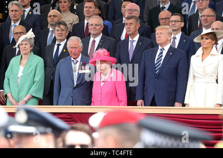 (front row, left to right) Prime Minister Theresa May, the Prince of Wales, Queen Elizabeth II, US President Donald Trump and Melania Trump during commemorations for the 75th Anniversary of the D-Day landings at Southsea Common, Portsmouth. Stock Photo