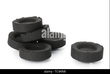 Pieces of coal for hookah on white background Stock Photo