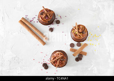 Tasty chocolate cupcakes on light background Stock Photo