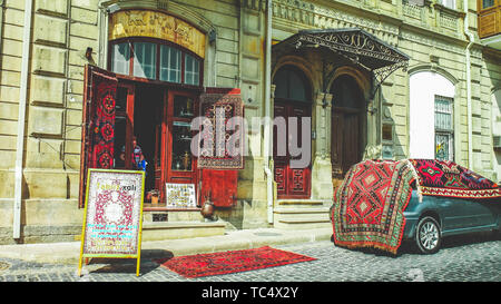 11th September 2017- Baku, Azerbaijan: Carpet shop in old city. Authentic, handamade old carpets for sale in Icheri Sheher. Stock Photo