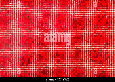 Old red tiled wall with small mosaic squares texture pattern background Stock Photo