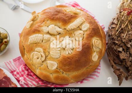 Homemade Christmas bread, traditional Serbian holiday bread serving on Christmas table. Stock Photo
