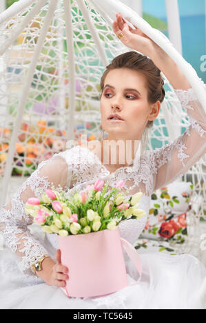 Portrait of beautiful young bride wearing wedding dress Stock Photo