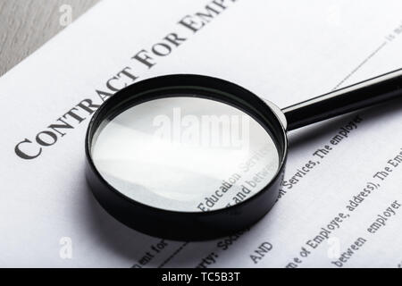 Magnifying Glass and document close up Stock Photo