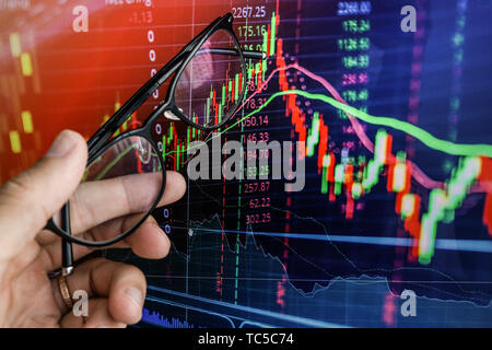 businessman shows the screen on laptop the graph of growth Stock Photo