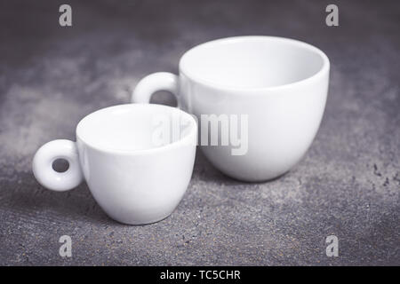 Empty White Espresso Coffee Cup on Dark Background Stock Photo