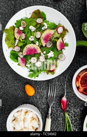Fresh Watermelon Radish salad. Vegan, vegetarian, clean eating, dieting, food concept. Stock Photo