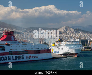 Smoke from ferries in the port of Piraeus near Athens Stock Photo