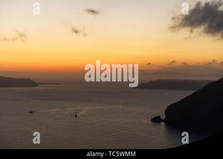 Elevated incredibly romantic sunset scene on Santorini. Stock Photo
