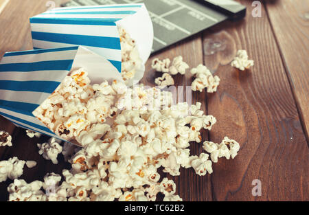 Movie Clapper Board in popcorn Stock Photo