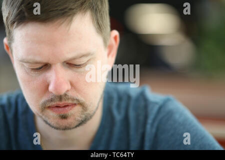 Sad and Overwhelmed Bearded Man Close-up Portrait Stock Photo