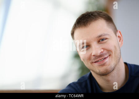 Handsome and Smiling Male Face Closeup Portrait Stock Photo