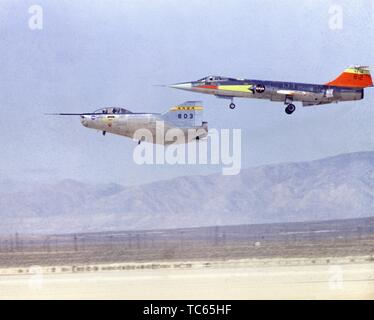 M2-F2 Lifting Body and F-104 Starfighter aircraft land at the NASA Dryden Flight Research Center, Edwards, California, November 21, 1966. Image courtesy National Aeronautics and Space Administration (NASA). () Stock Photo