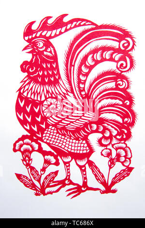 Paper-cut chicken on the zodiac Stock Photo