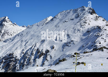 The Bettmerhorn above the Aletsch Glacier with the Betterhorn cable car on the right. In the Bernese Alps, Switzerland, in the winter Stock Photo