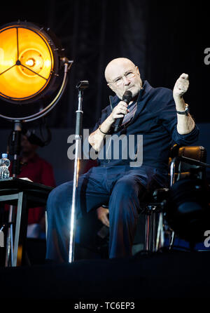 Stuttgart, Germany. 05th June, 2019. Singer Phil Collins sits on stage and sings. Collins gives the first of seven German concerts in the Mercedes-Benz Arena. Credit: Christoph Schmidt/dpa/Alamy Live News Stock Photo