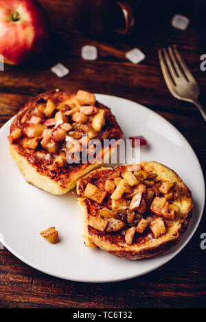 French toasts with chopped apple caramelized with cinnamon Stock Photo