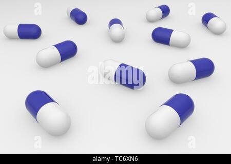 A group of blue white pills on a white background. Antibiotics in the capsule. 3d rendering Stock Photo