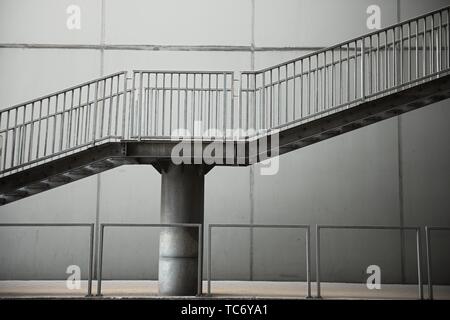Emergency exit by a stairwell in a modern building Stock Photo