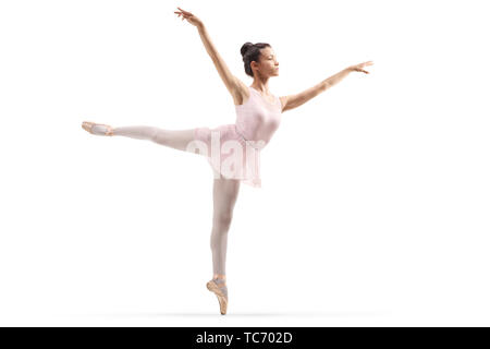 Full length shot of a young beautiful ballerina dancing isolated on white background Stock Photo