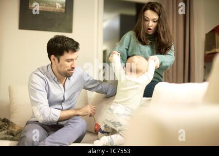 couple with baby at home, in Munich, Germany