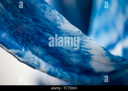 Batik braid glowing dots abstract background Stock Photo