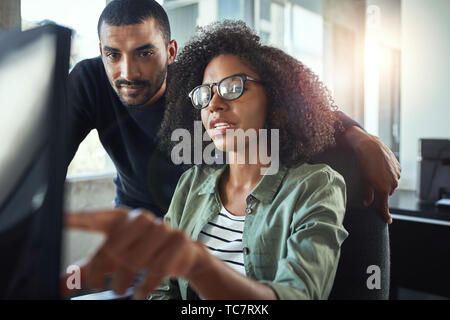 Two business colleagues working together in office Stock Photo