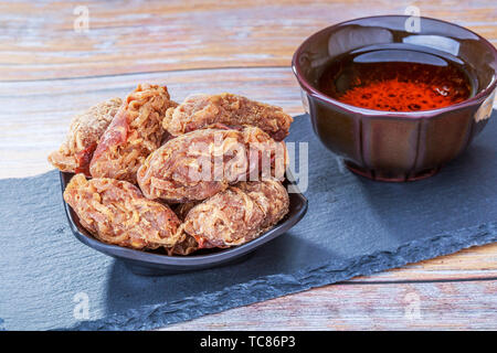 Fruit cake small food three bags, the main raw materials are peach, papaya silk, ginger silk, white sesame seeds, white granulated sugar. Stock Photo