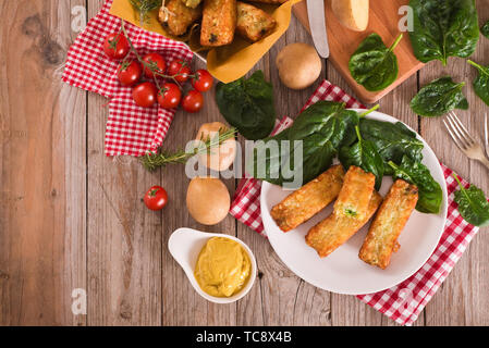 Potato croquettes with spinach and mozzarella. Stock Photo