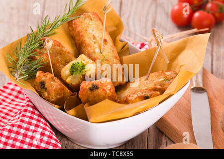 Potato croquettes with spinach and mozzarella. Stock Photo