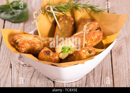 Potato croquettes with spinach and mozzarella. Stock Photo